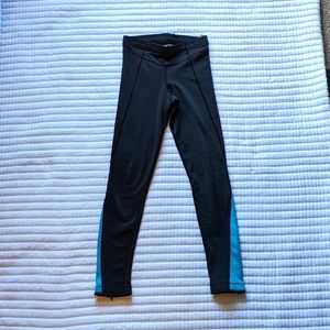 Sugoi Blue and Black Zipper Leggings